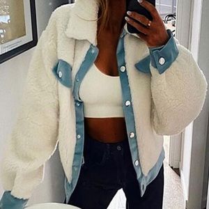White jacket with blue accent (faux fur)